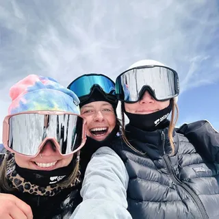 Women skiing together